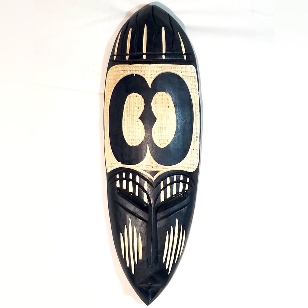 Handcrafted Wall Decor Mask in Black and Cream with hand carved Adinkra symbol.